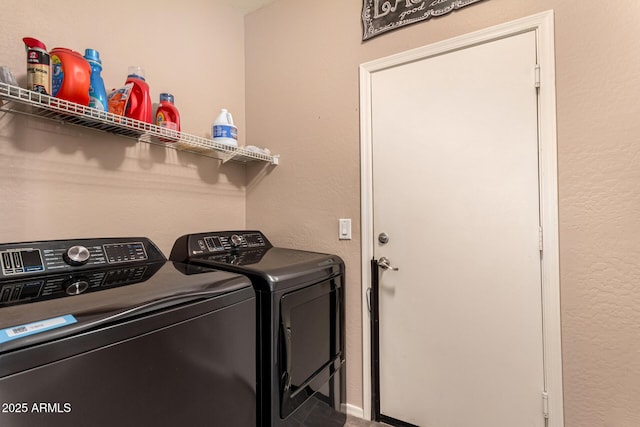 laundry room with separate washer and dryer