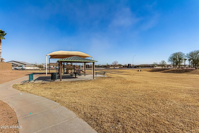 surrounding community with a gazebo and a lawn