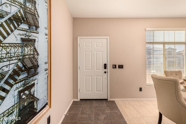 view of tiled foyer entrance