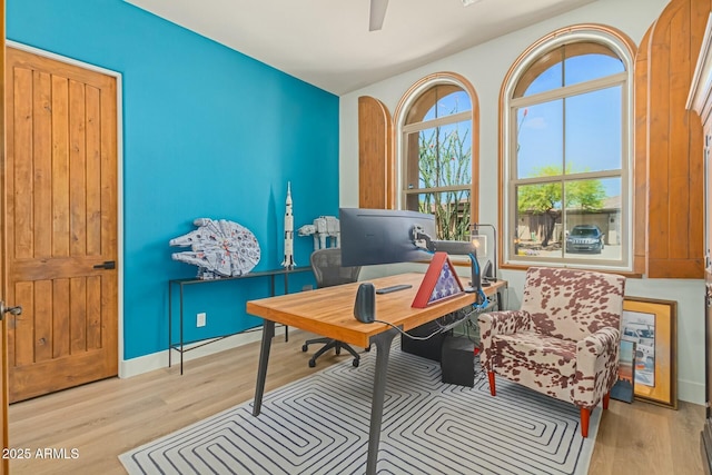 office with wood finished floors and ceiling fan