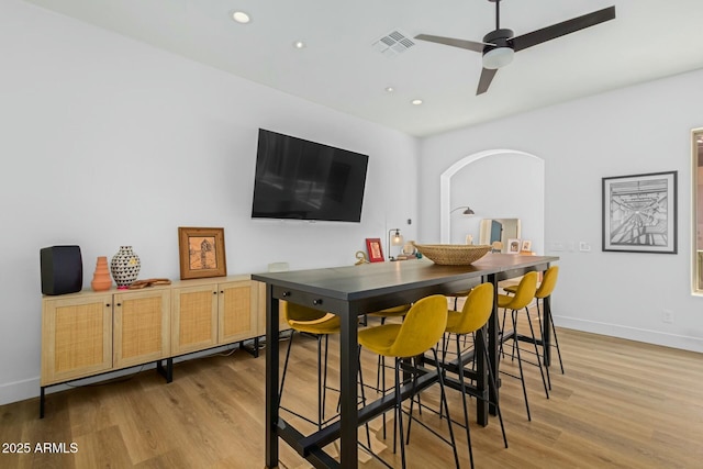 dining space with light wood-type flooring, baseboards, recessed lighting, and ceiling fan