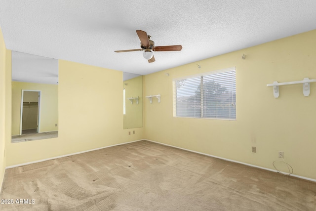 4062 W Mescal St, Phoenix, AZ 85029 - empty room with ceiling fan, carpet flooring, baseboards, and a textured ceiling