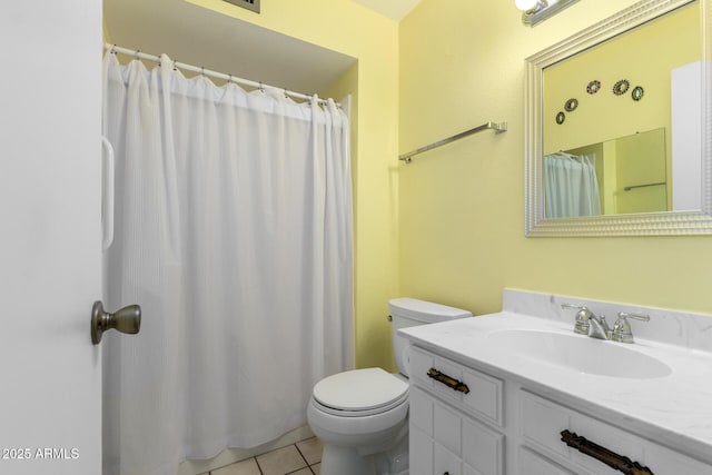 4062 W Mescal St, Phoenix, AZ 85029 - full bathroom with vanity, toilet, tile patterned flooring, and a shower with shower curtain