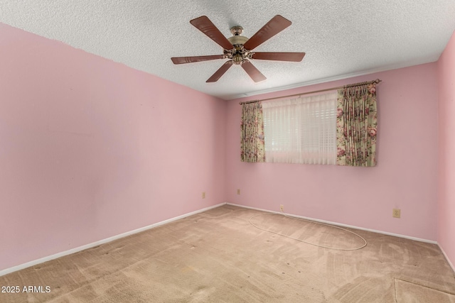 4062 W Mescal St, Phoenix, AZ 85029 - unfurnished room with carpet floors, a ceiling fan, a textured ceiling, and baseboards