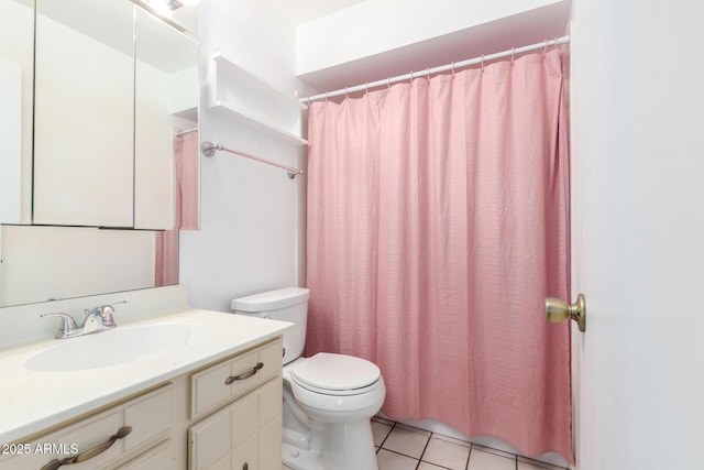4062 W Mescal St, Phoenix, AZ 85029 - full bathroom with toilet, tile patterned floors, vanity, and a shower with shower curtain
