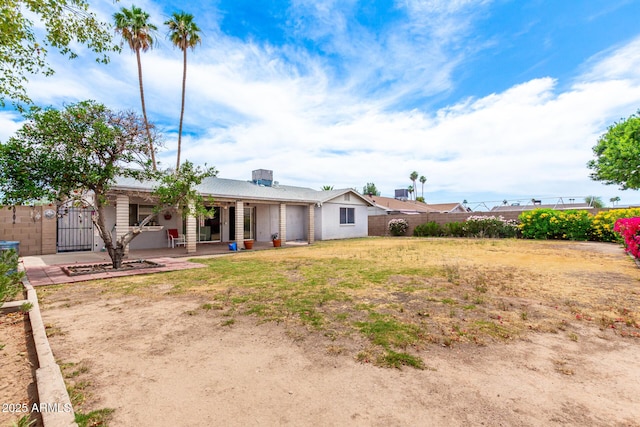 4062 W Mescal St, Phoenix, AZ 85029 - back of property with a fenced backyard, a patio, and a gate