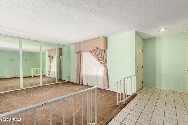 4062 W Mescal St, Phoenix, AZ 85029 - carpeted spare room with a textured ceiling