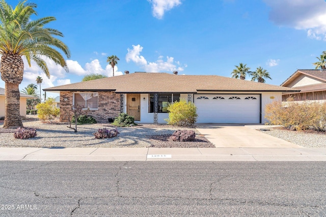 ranch-style house featuring a garage