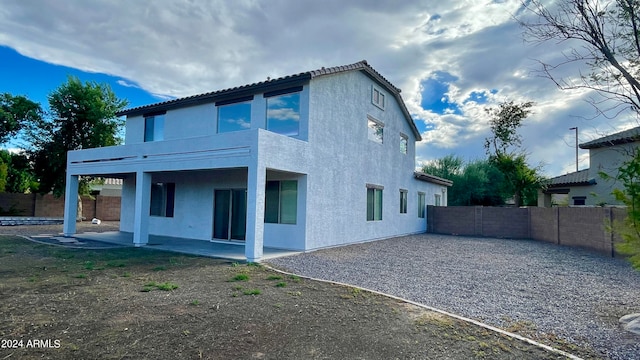 rear view of house with a patio area