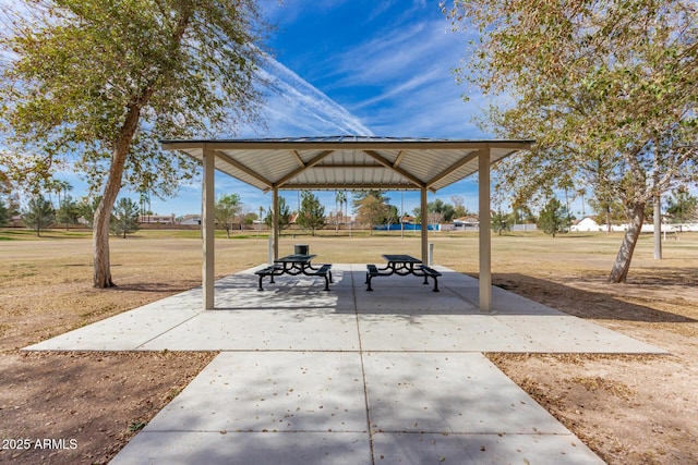 view of property's community featuring a yard, a patio, and a gazebo