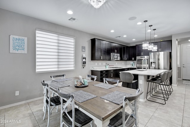 tiled dining area with sink