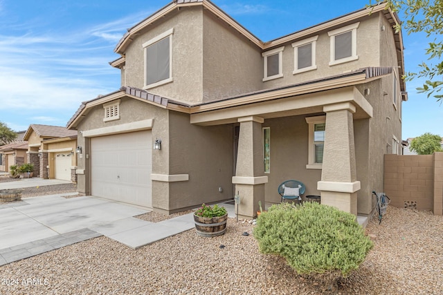 view of front of property with a garage