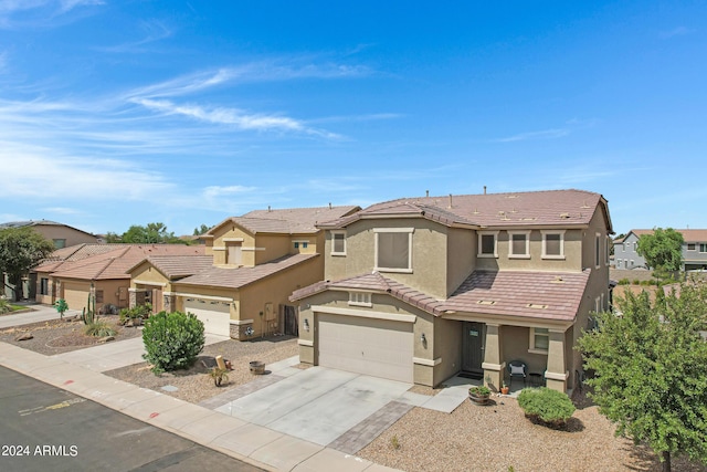 front of property with a garage