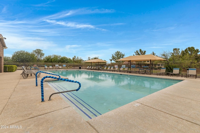 view of swimming pool featuring a patio