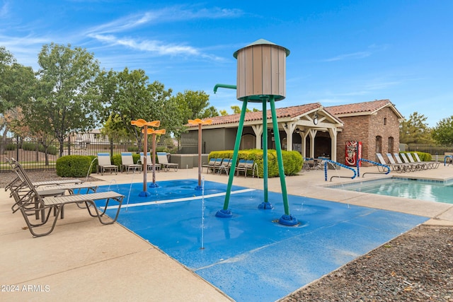 view of swimming pool featuring a patio