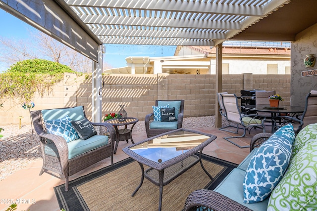 view of patio with an outdoor living space and a pergola