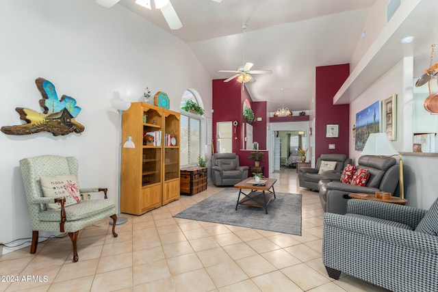 tiled living room featuring high vaulted ceiling and ceiling fan