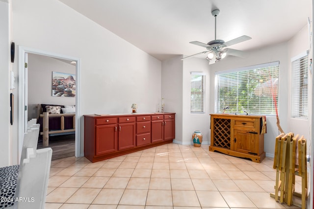 interior space featuring ceiling fan and light tile patterned flooring