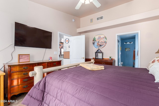 bedroom with ensuite bathroom and ceiling fan