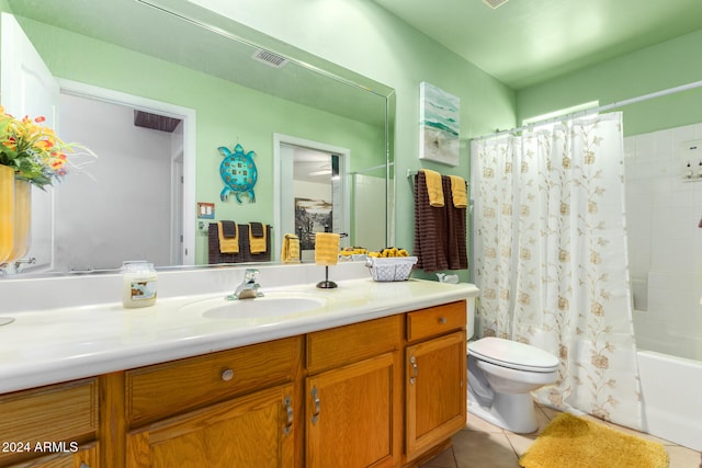 full bathroom with toilet, vanity, tile patterned floors, and shower / bath combination with curtain