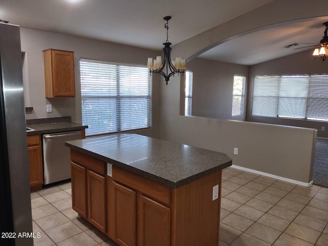 kitchen featuring dishwasher, pendant lighting, light tile patterned floors, and plenty of natural light