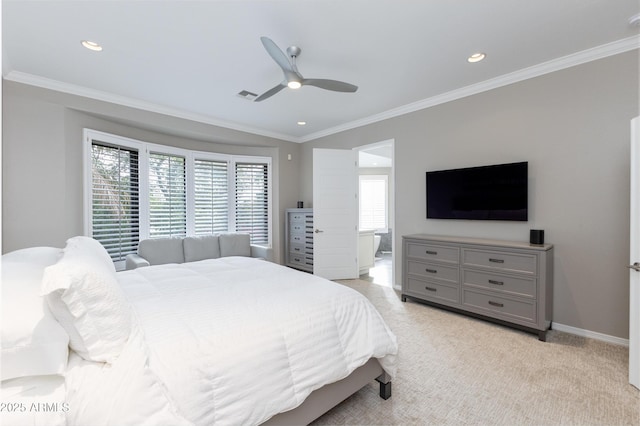 carpeted bedroom featuring ceiling fan, ornamental molding, and ensuite bathroom