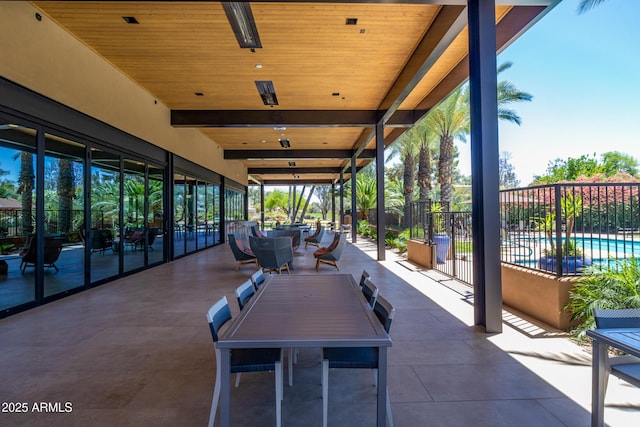 view of patio featuring a fenced in pool