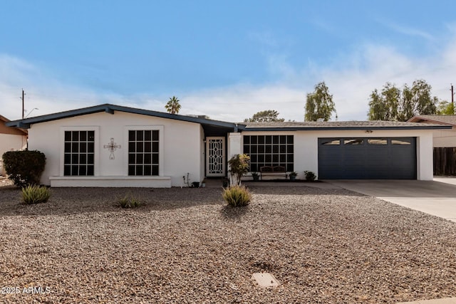 single story home featuring a garage