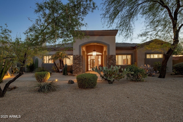 9417 E Charter Oak Dr, Scottsdale, AZ 85260 - mediterranean / spanish home with stucco siding and stone siding