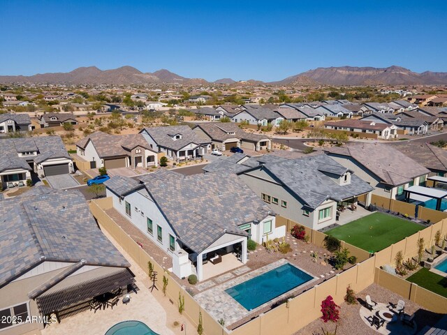 aerial view with a residential view and a mountain view