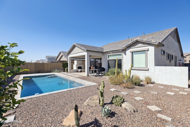 view of pool with a patio area, a fenced backyard, and a fenced in pool