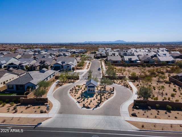 drone / aerial view with a residential view and a mountain view