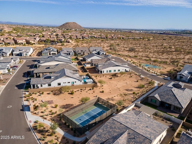 birds eye view of property with a residential view and a mountain view