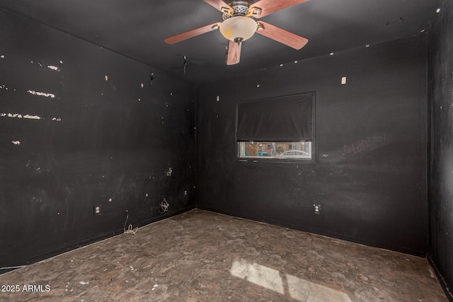 unfurnished room featuring a ceiling fan