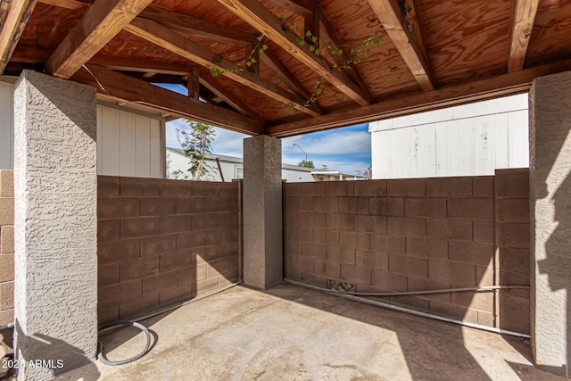 view of patio with fence
