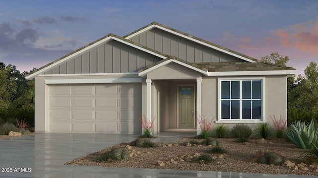 view of front facade with concrete driveway, board and batten siding, and an attached garage