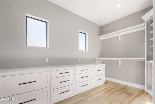 walk in closet featuring light wood-type flooring