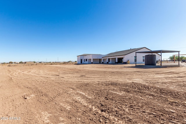 view of yard with a carport