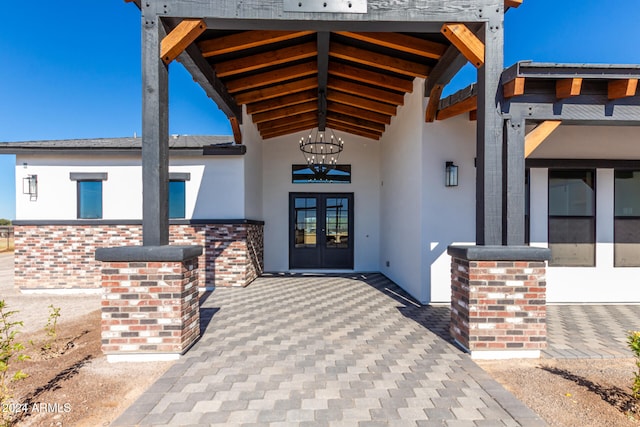 doorway to property featuring french doors