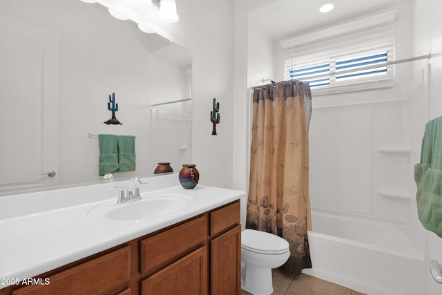 full bathroom featuring tile patterned flooring, shower / tub combo, vanity, and toilet