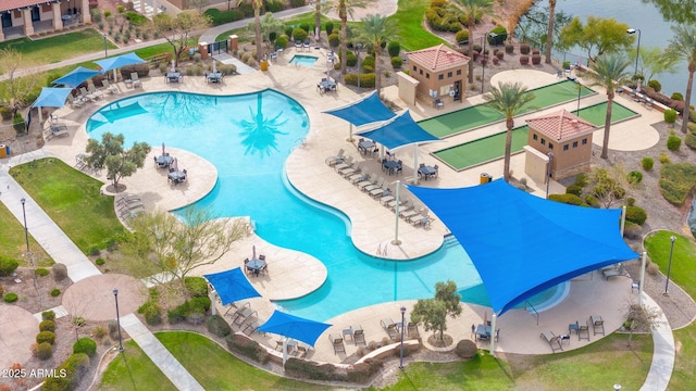 view of swimming pool featuring a patio area