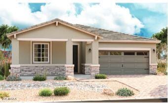 40546 W Michaels Dr, Maricopa, AZ 85138 - view of front of property with an attached garage, stone siding, decorative driveway, stucco siding, and covered porch