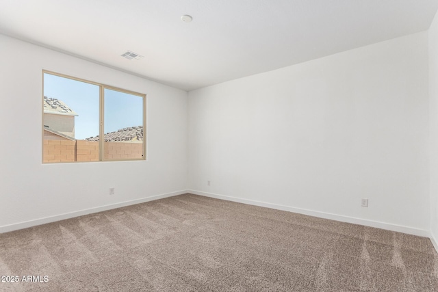 40546 W Michaels Dr, Maricopa, AZ 85138 - empty room featuring carpet and baseboards