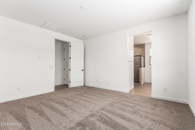 40546 W Michaels Dr, Maricopa, AZ 85138 - carpeted empty room featuring baseboards