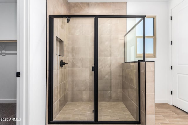 40546 W Michaels Dr, Maricopa, AZ 85138 - bathroom featuring baseboards and a shower stall