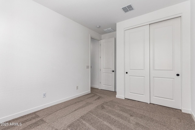 40546 W Michaels Dr, Maricopa, AZ 85138 - unfurnished bedroom featuring carpet, baseboards, and a closet