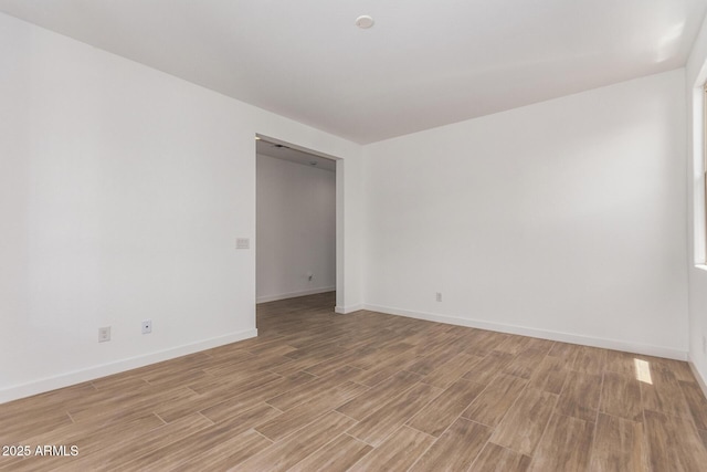 40546 W Michaels Dr, Maricopa, AZ 85138 - empty room featuring light wood-type flooring and baseboards