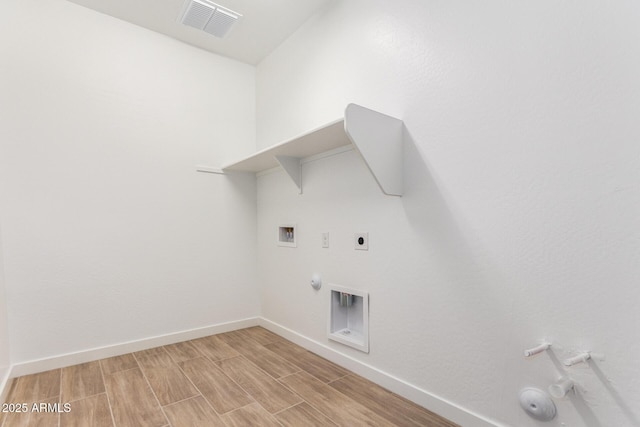 40546 W Michaels Dr, Maricopa, AZ 85138 - laundry room featuring hookup for a gas dryer, hookup for a washing machine, hookup for an electric dryer, and wood finish floors
