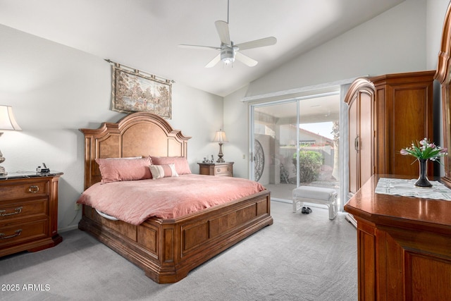 carpeted bedroom featuring ceiling fan and lofted ceiling