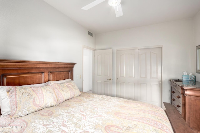 bedroom featuring ceiling fan and a closet